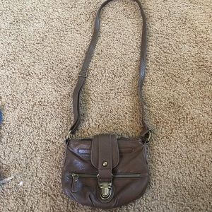 Tan strap body purse